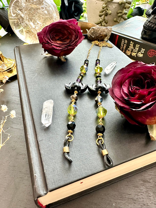 Green, purple, black, bats eye glasses holders