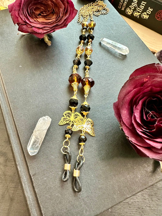 Black and amber monarch eye glasses holders