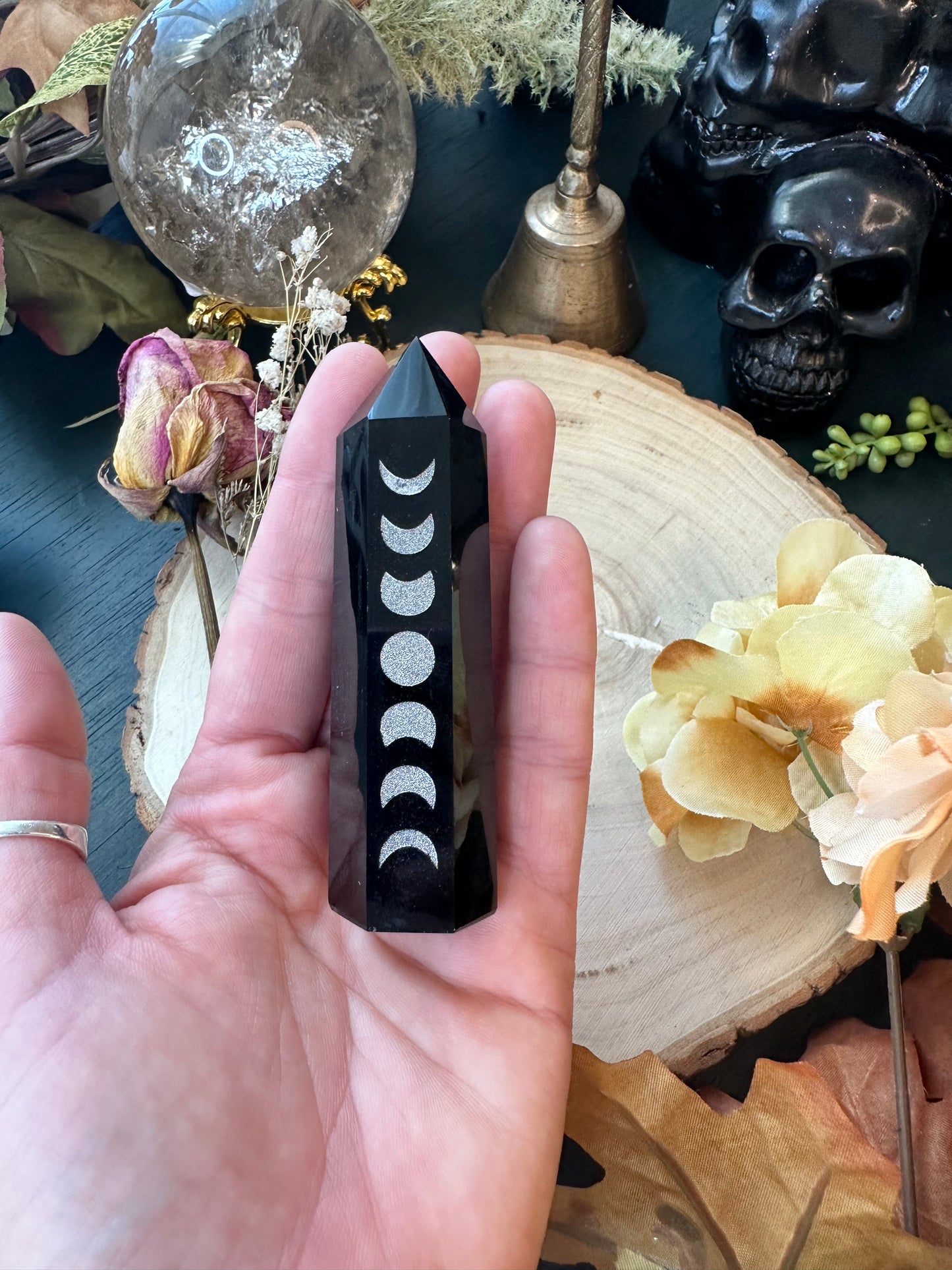 Obsidian moon phase tower