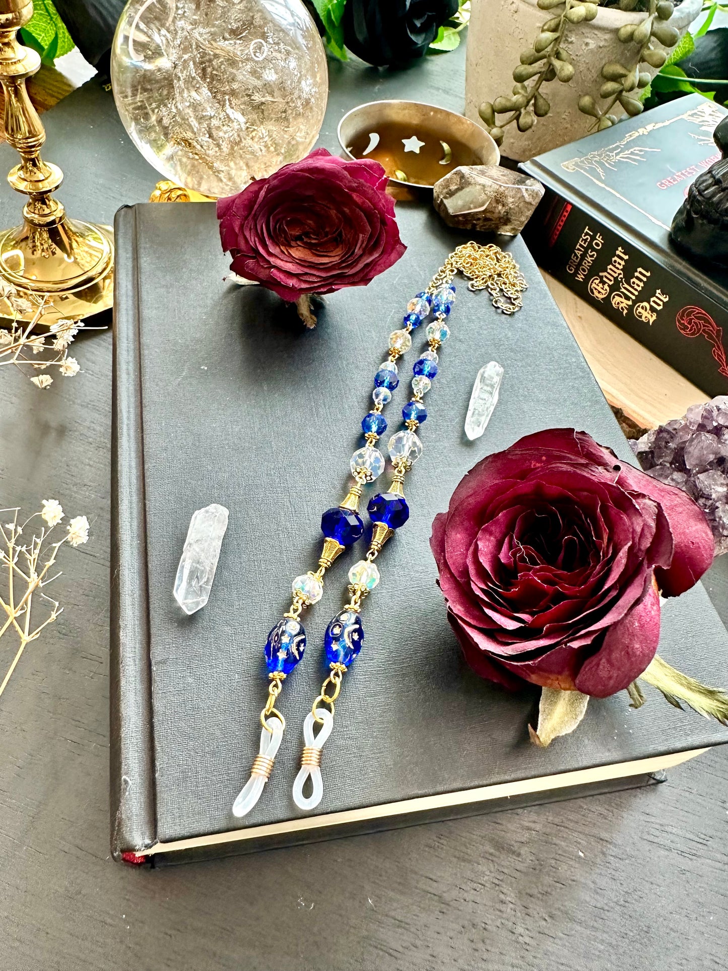 Blue and gold eye glasses holders