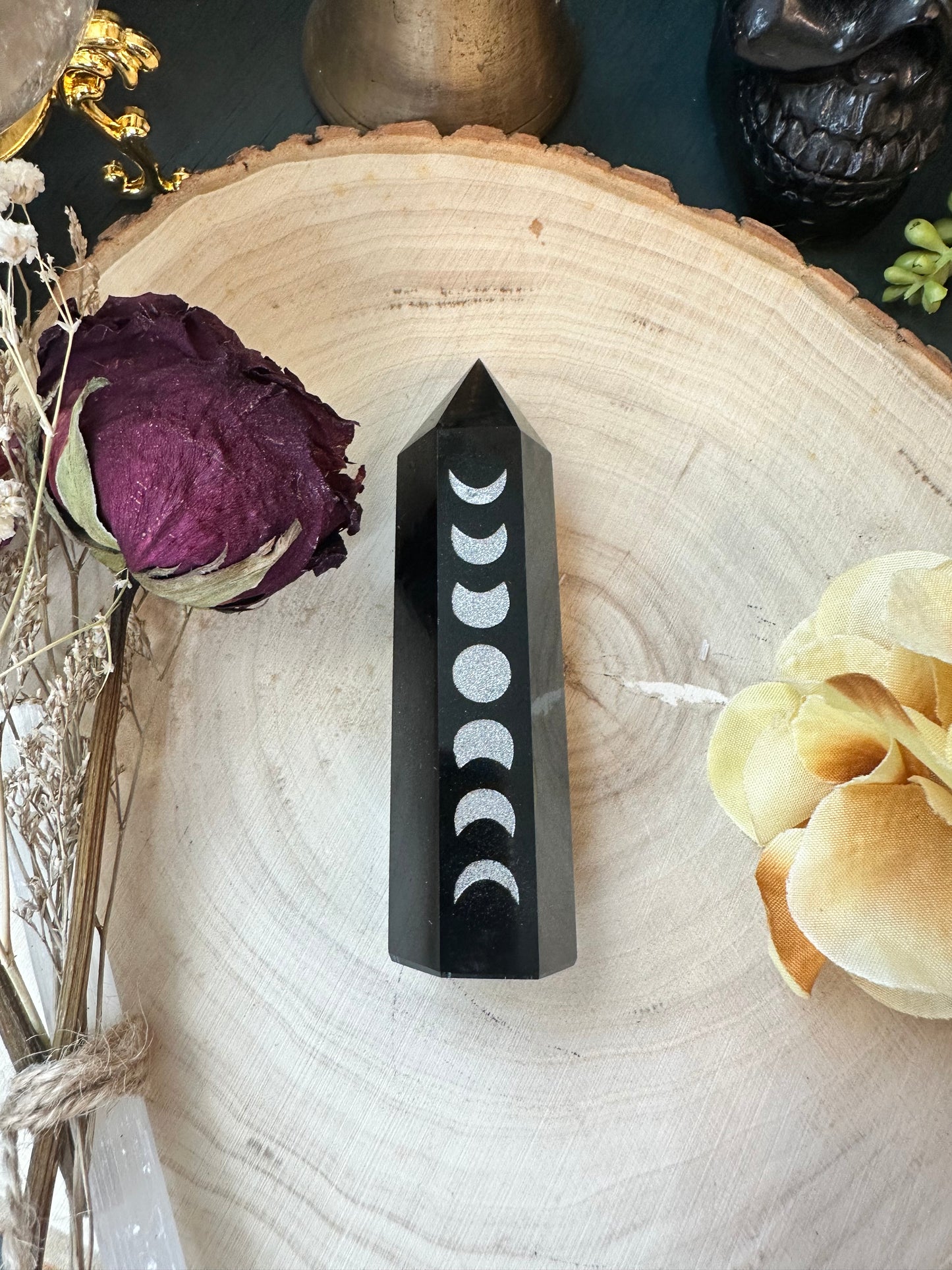 Obsidian moon phase tower