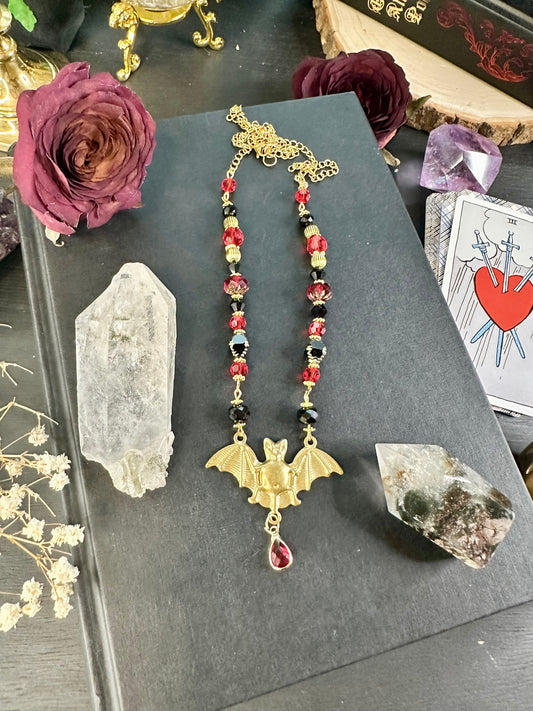 Red and black bat necklace