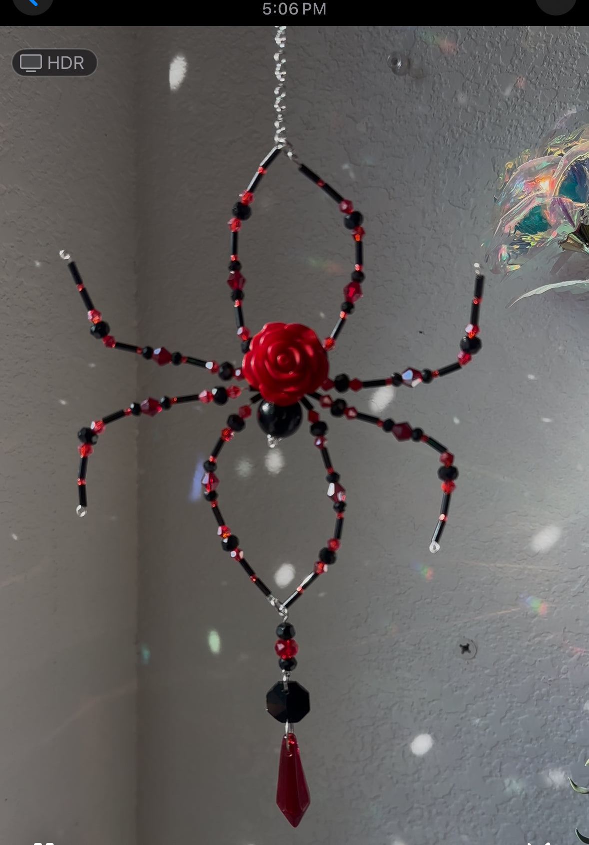 Black and red spider suncatcher