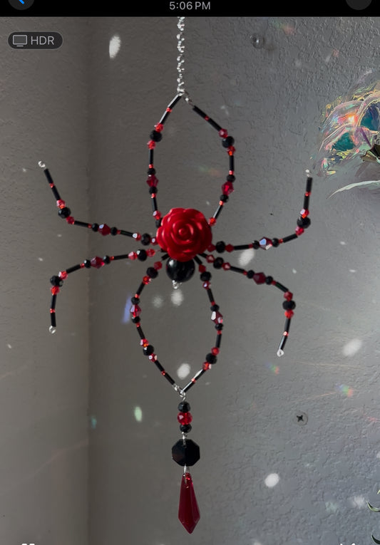 Black and red spider suncatcher