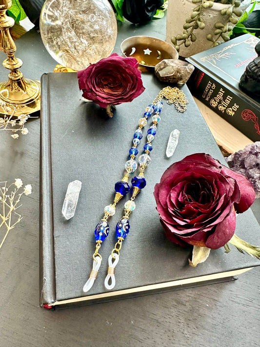 Blue and gold eye glasses holders