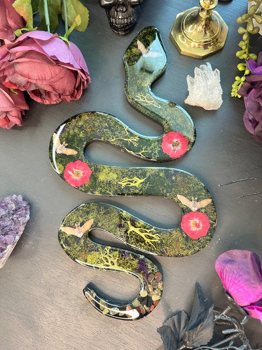 Mossy snake with bats and roses wall hang