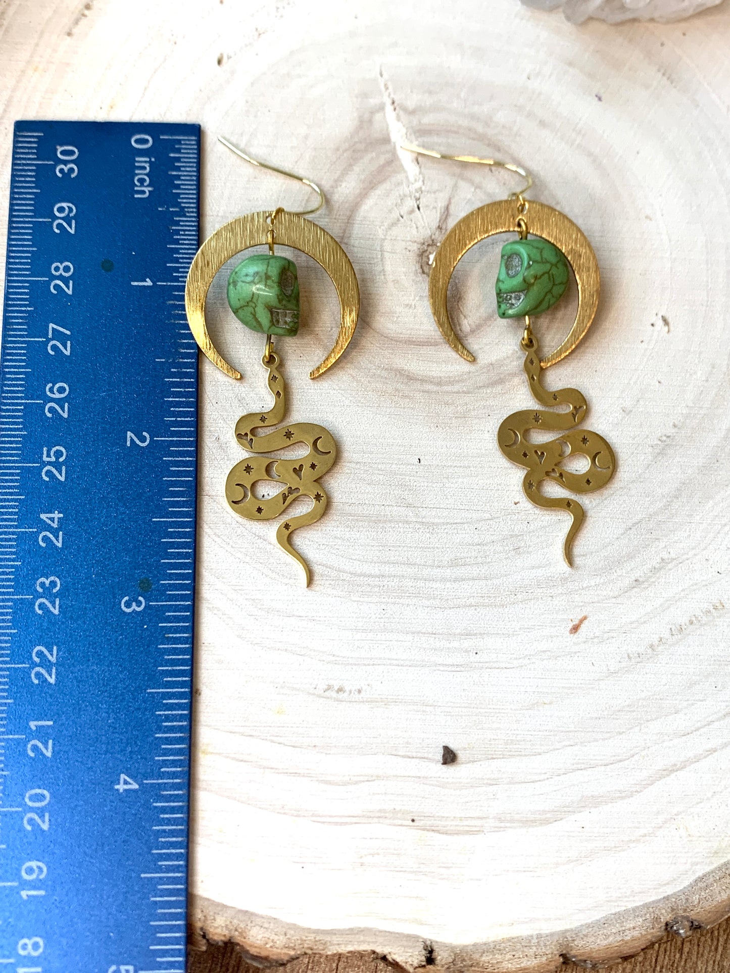 Skull and snake celestial earrings