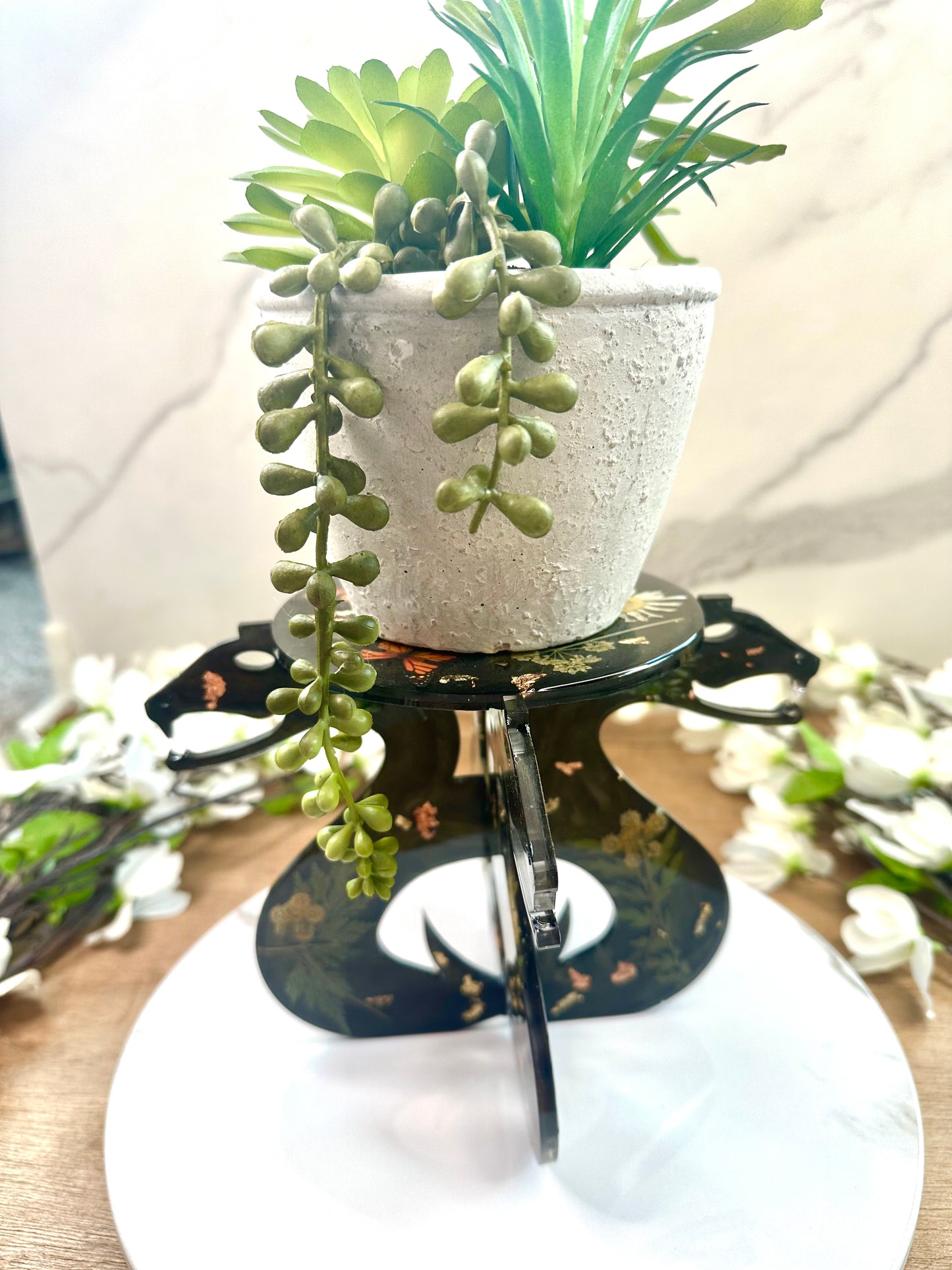 Resin snake floral plant stand