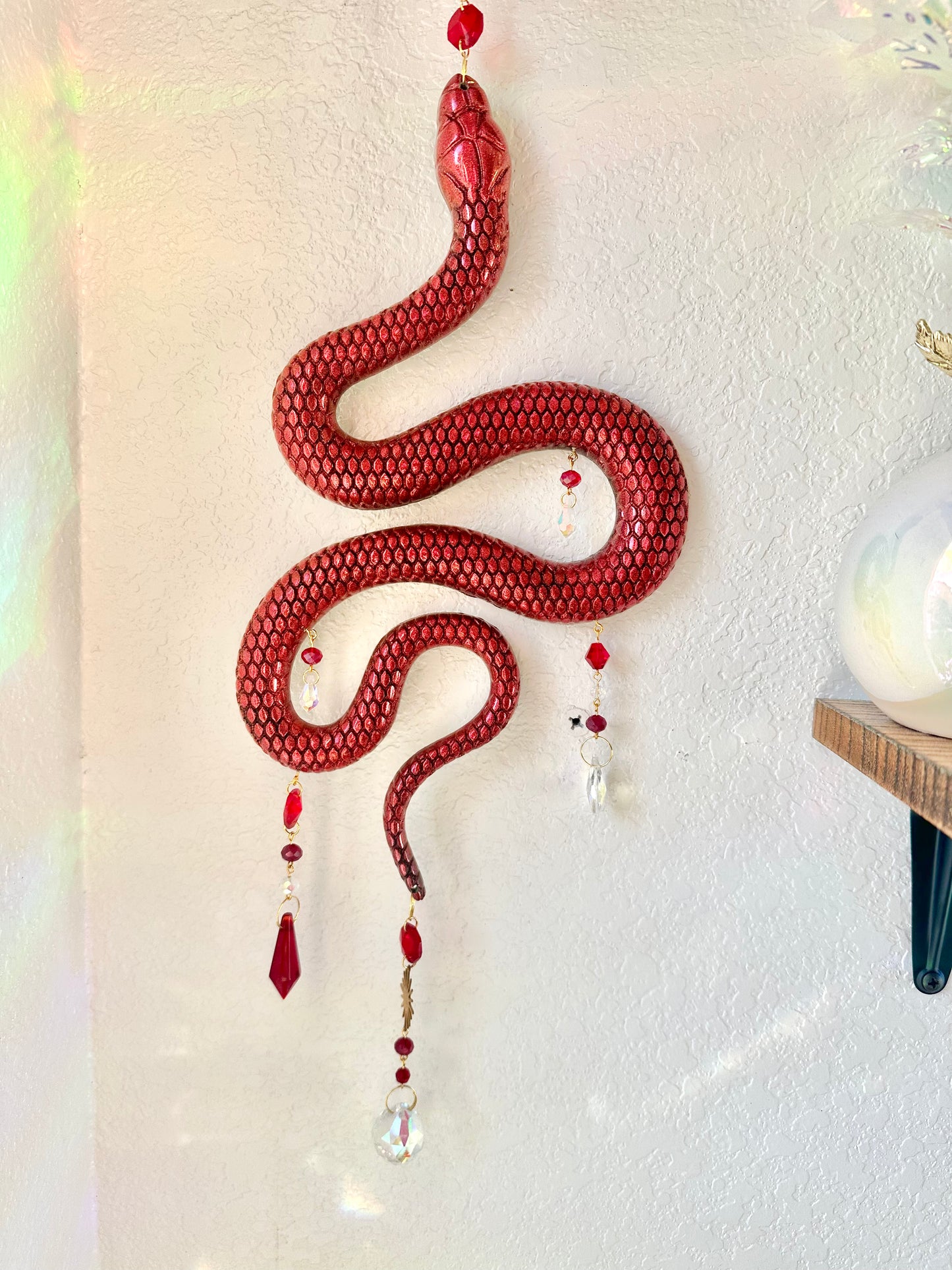 Red holographic snake sun-catcher